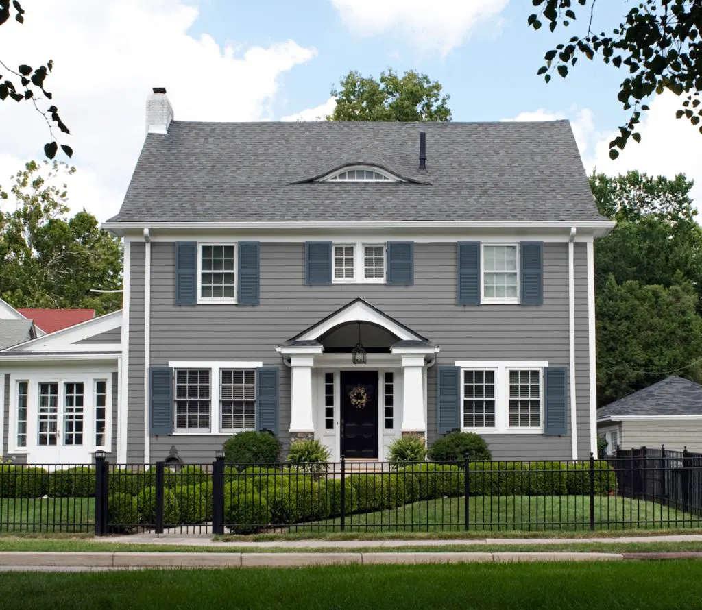 Gray House with Smoky Blue Shutters