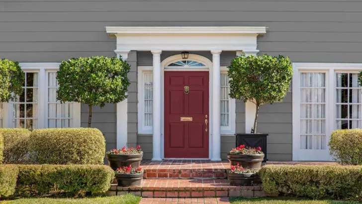 elegant wine red front door with gray house