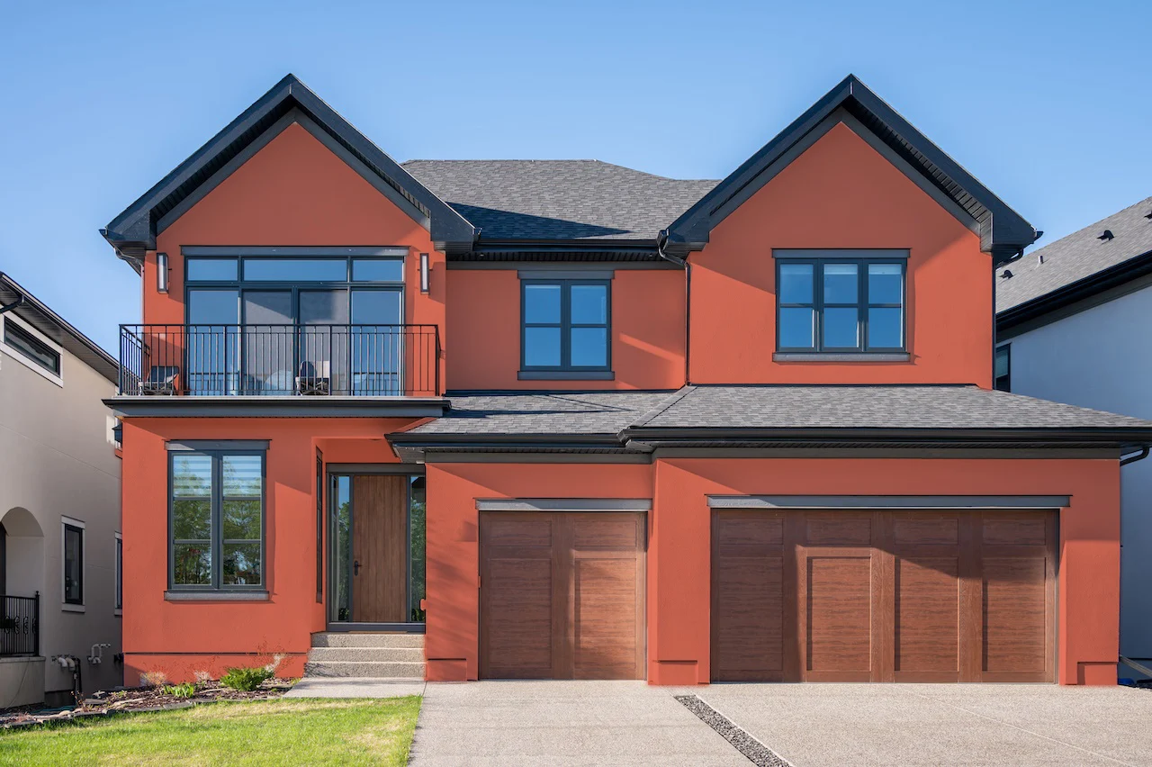 earthy terracotta house with gray roof