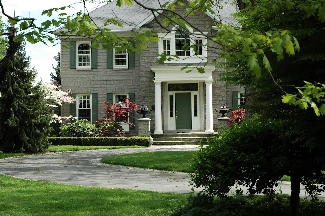 gray house with green shutters
